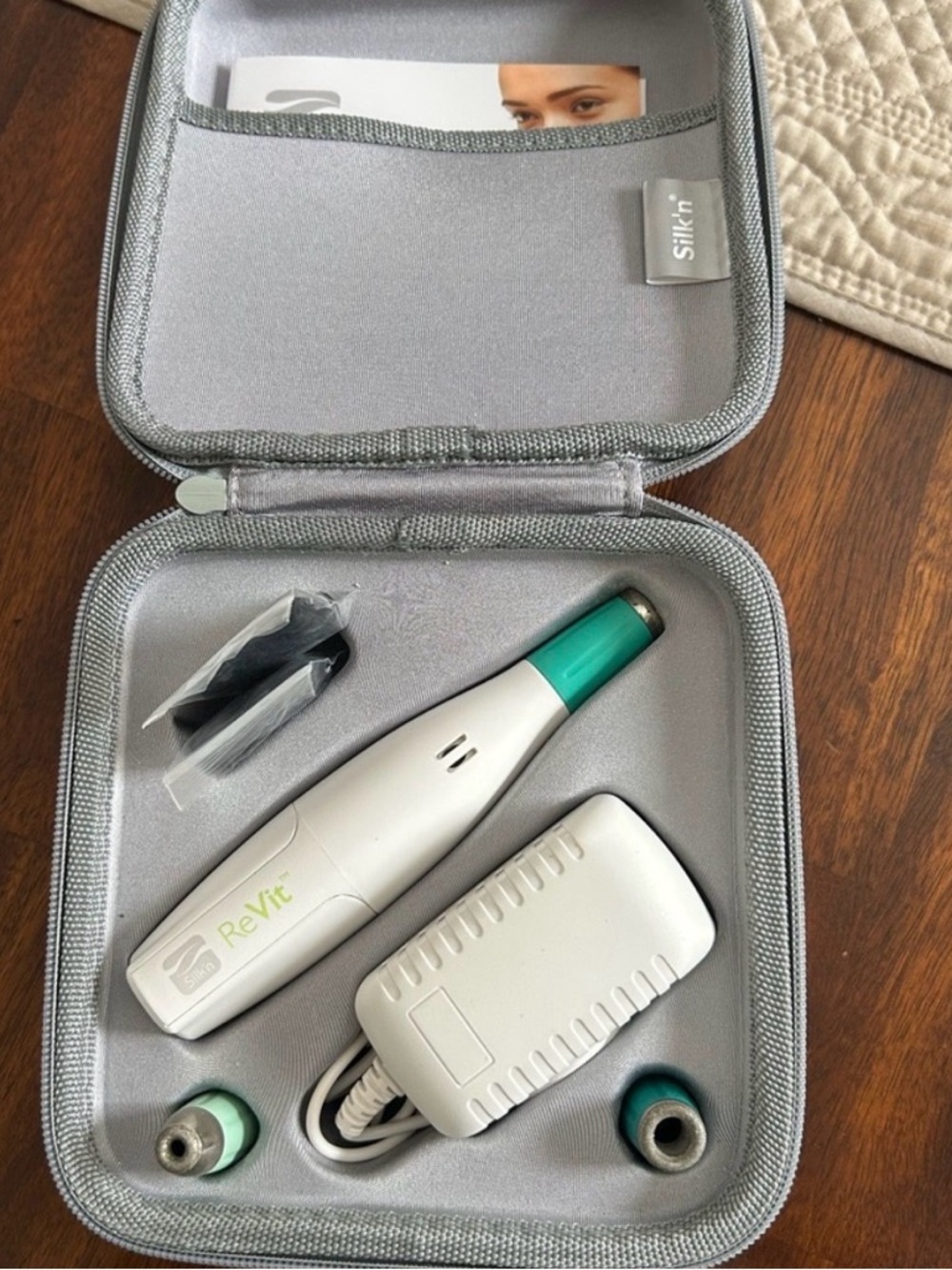 ReVit Microdermabrasion Device in White & Teal